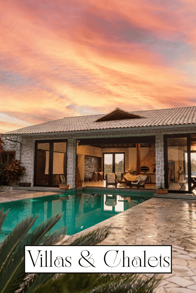 luxury villa with pool at sunset