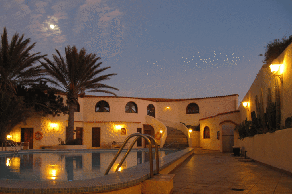 a hotel in tenerife after sunset with yellow lights